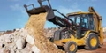Heavy equipment clearing construction debris and site preparation Safe Demo Dallas land clearing Dallas TX