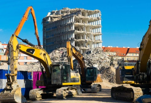 Safe Demo Dallas large scale demolition with multiple excavators clearing concrete and debris