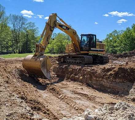 Safe Demo Dallas excavation work using heavy equipment for grading and land development