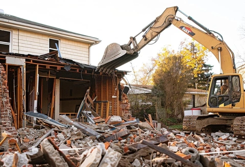 Safe Demo Dallas demolition equipment clearing residential property for redevelopment